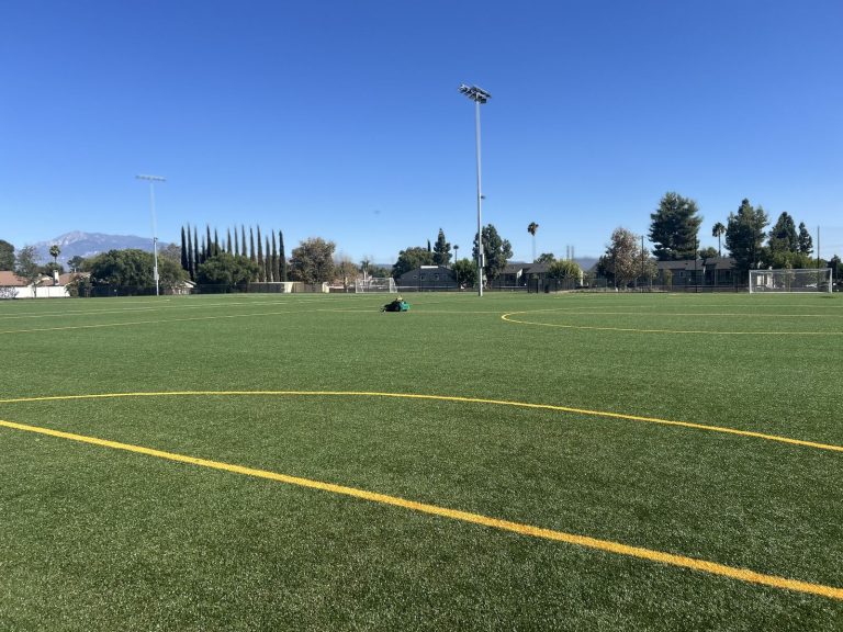 Completed artificial turf sports field at Beaumont Sports Park with new sports-field lighting