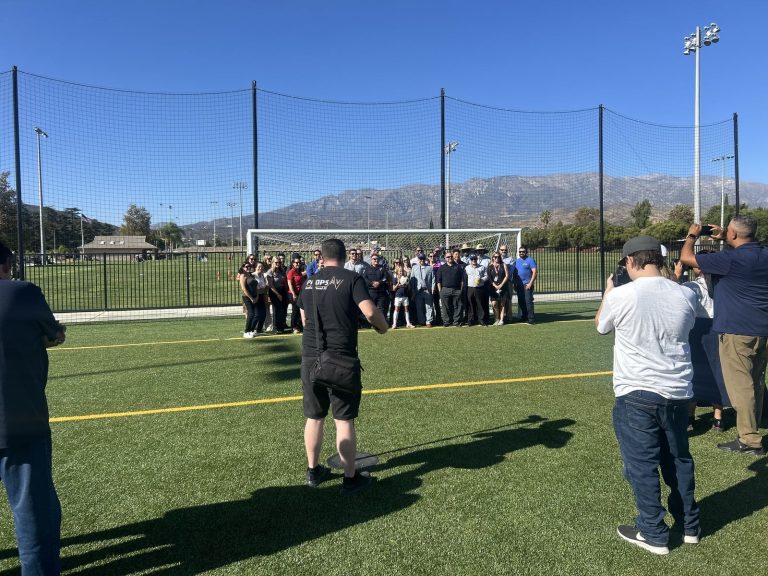 Crowd gathered at the goal for the Beaumont Sports Park ribbon cutting